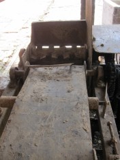 Detail of the Vietnamese brick making machine. The first brickmaking machines were invented in the UK during the time of the Brick Tax.